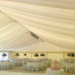 Wedding Themed Marquee With Beautifully Dressed Tables